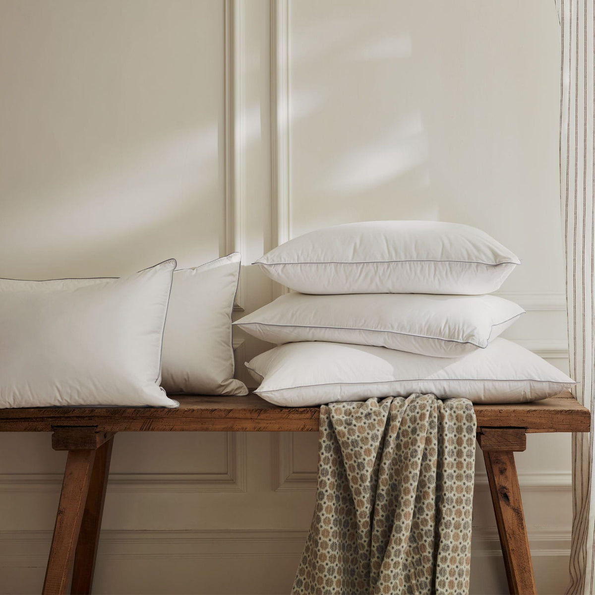 Hungarian goose down pillows on bench