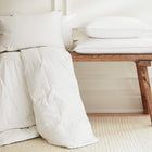 Hungarian goose down duvet and pillows on a bench | Scooms