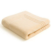 Egyptian cotton bath mat in creme - pack shot. Scooms