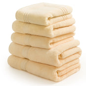 Egyptian bath towel bundle containing 2 bath towels, 2 hand towels and a bath mat in creme. Scooms