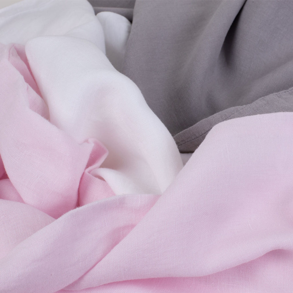 Pink, white and grey linen sheets. Scooms