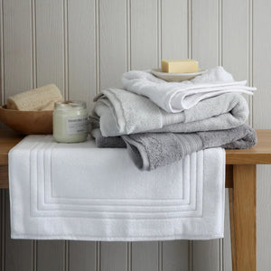 Bath towels, Soap and Back Scrub On Wooden Bench | scooms