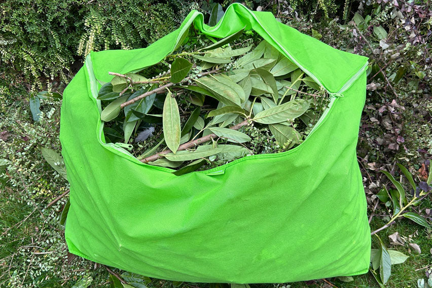 Duvet storage bag used to collect garden waste