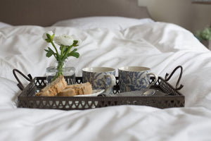 Breakfast tray on Egyptian cotton bed linen