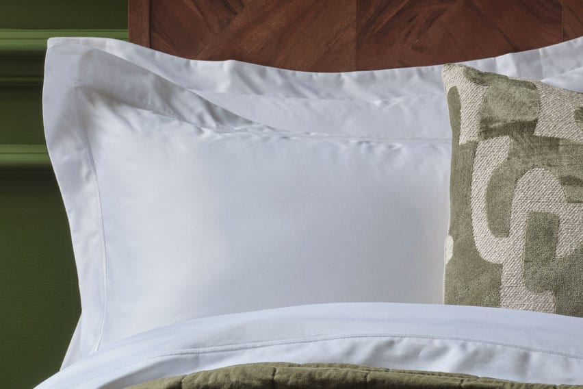 Egyptian Cotton Bedding in White on a bed - Scooms