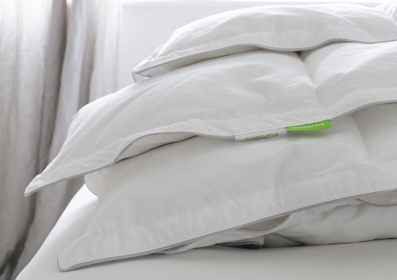 Hungarian goose down duvet folded showing Scooms logo