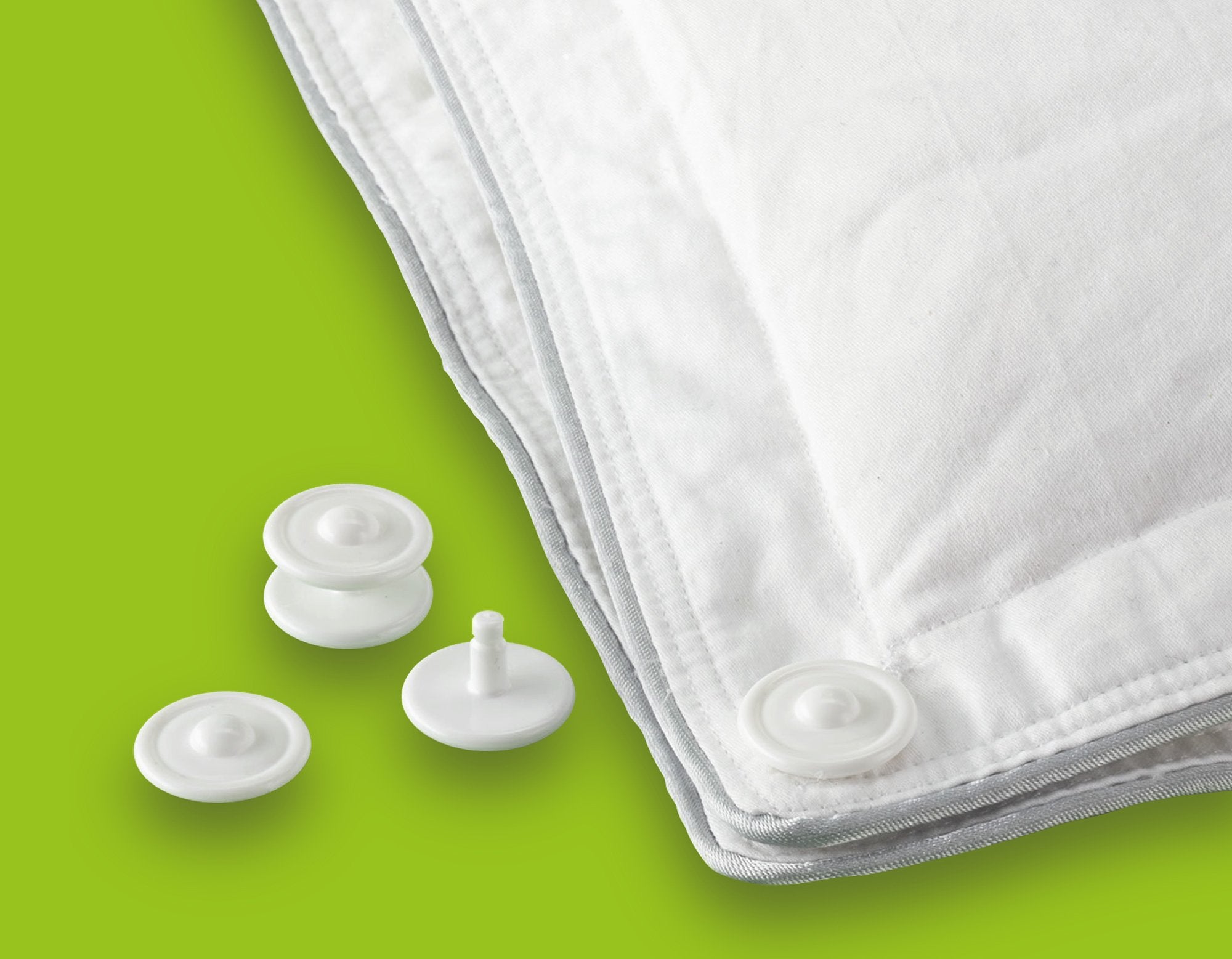 Close up of Duvet Fasteners with a Duvet | scooms