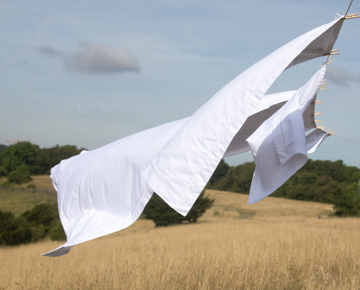 Cotton Sheets Blowing in the Wind on a Hot Summers Day | scooms