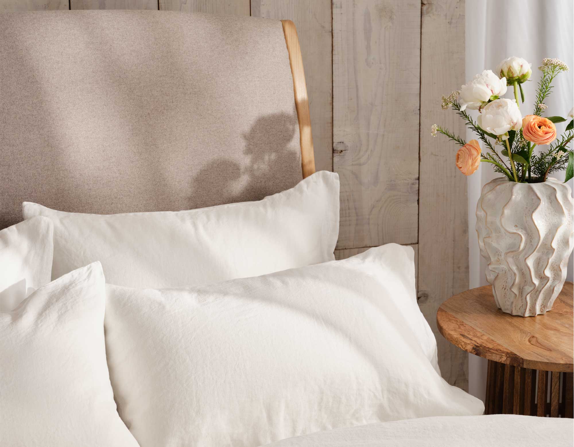 White Linen Pillowcases on Bed