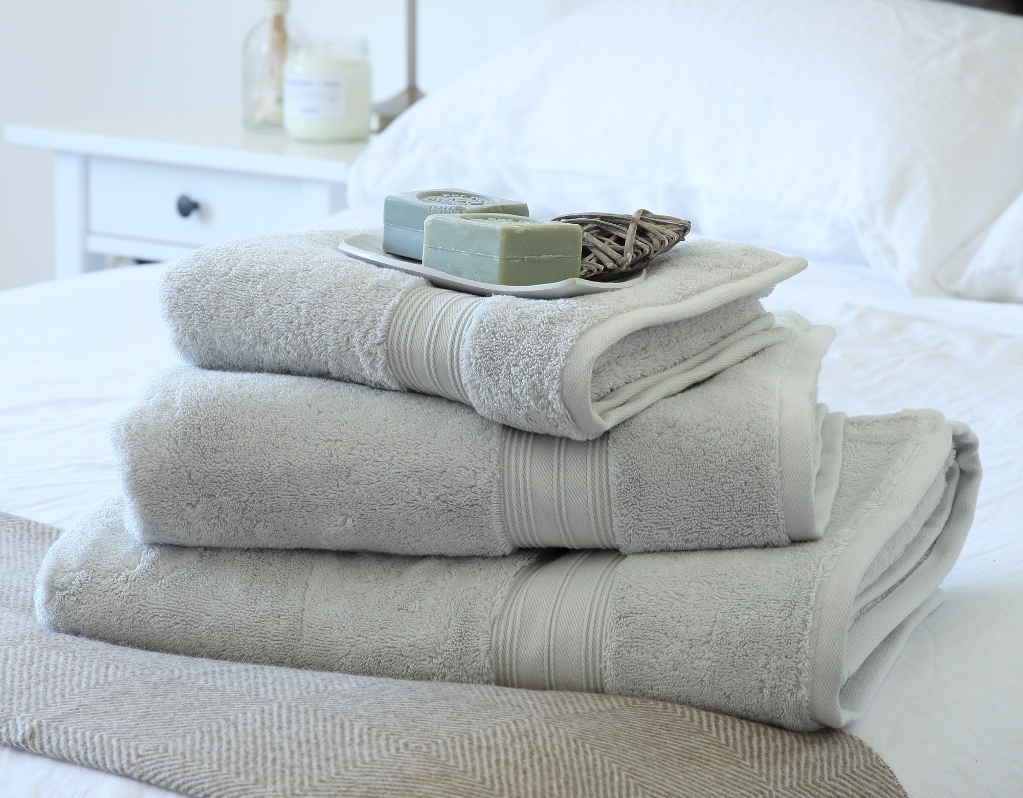 Towel Bale on Bed with White Linen | scooms