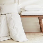 Hungarian goose down duvet and pillows on a bench | Scooms