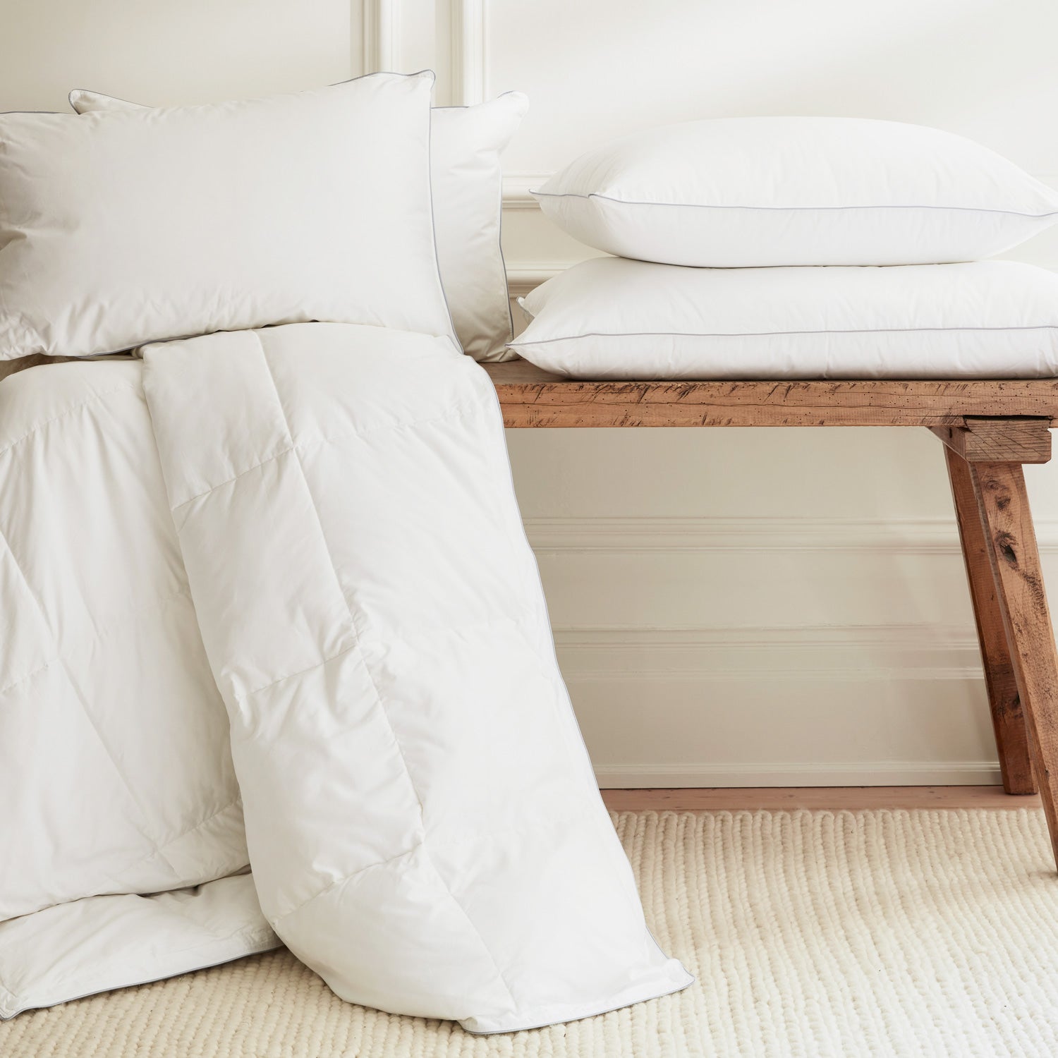 Hungarian goose down duvet and pillows on a bench | Scooms