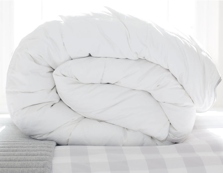 Superking goose down duvet 13.5 tog all seasons folded showing scooms brand and care labels