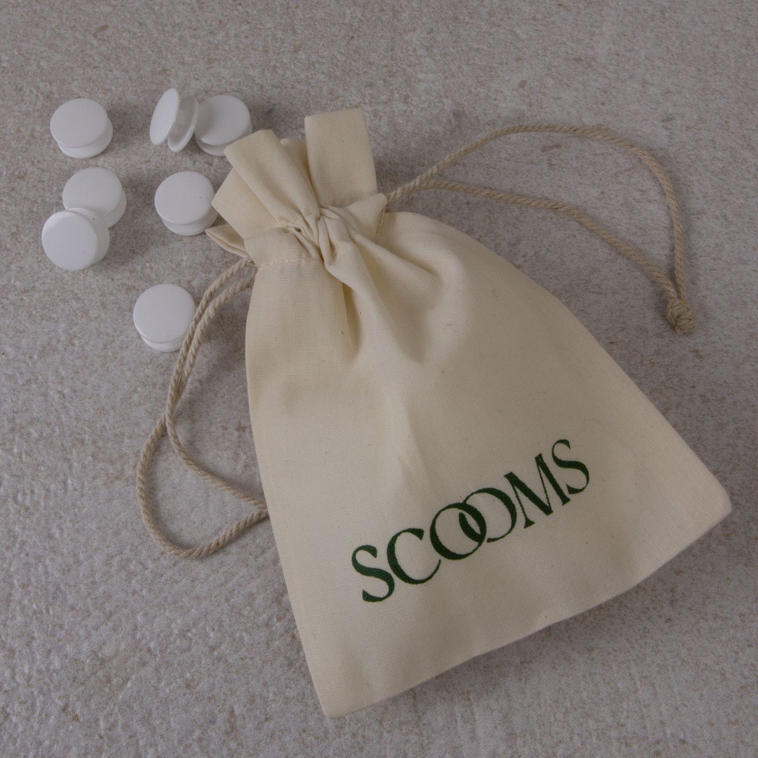 Duvet fasteners with a Scooms branded fastener bag