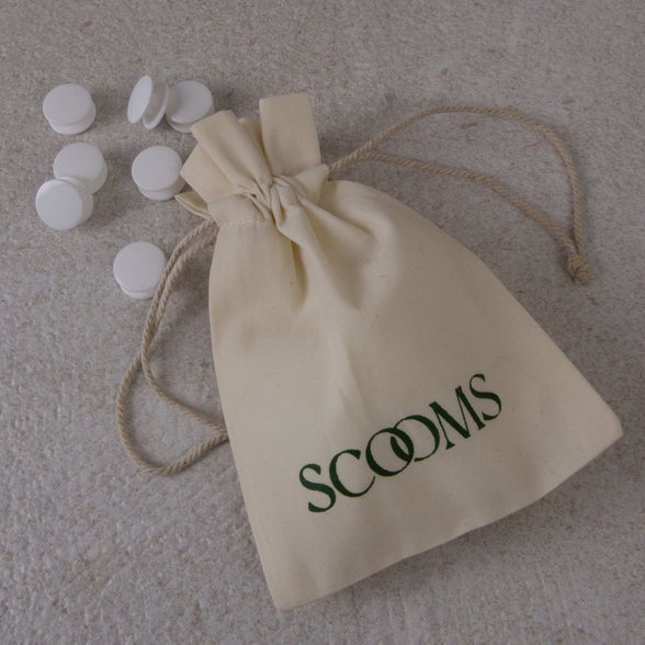 Duvet fasteners with a Scooms branded fastener bag