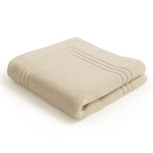 Folded Egyptian cotton natural bath mat | Scooms