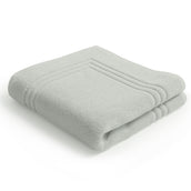 Folded Egyptian cotton sage green bath mat | Scooms