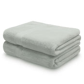 Folded pair of sage green Egyptian cotton bath sheets | Scooms