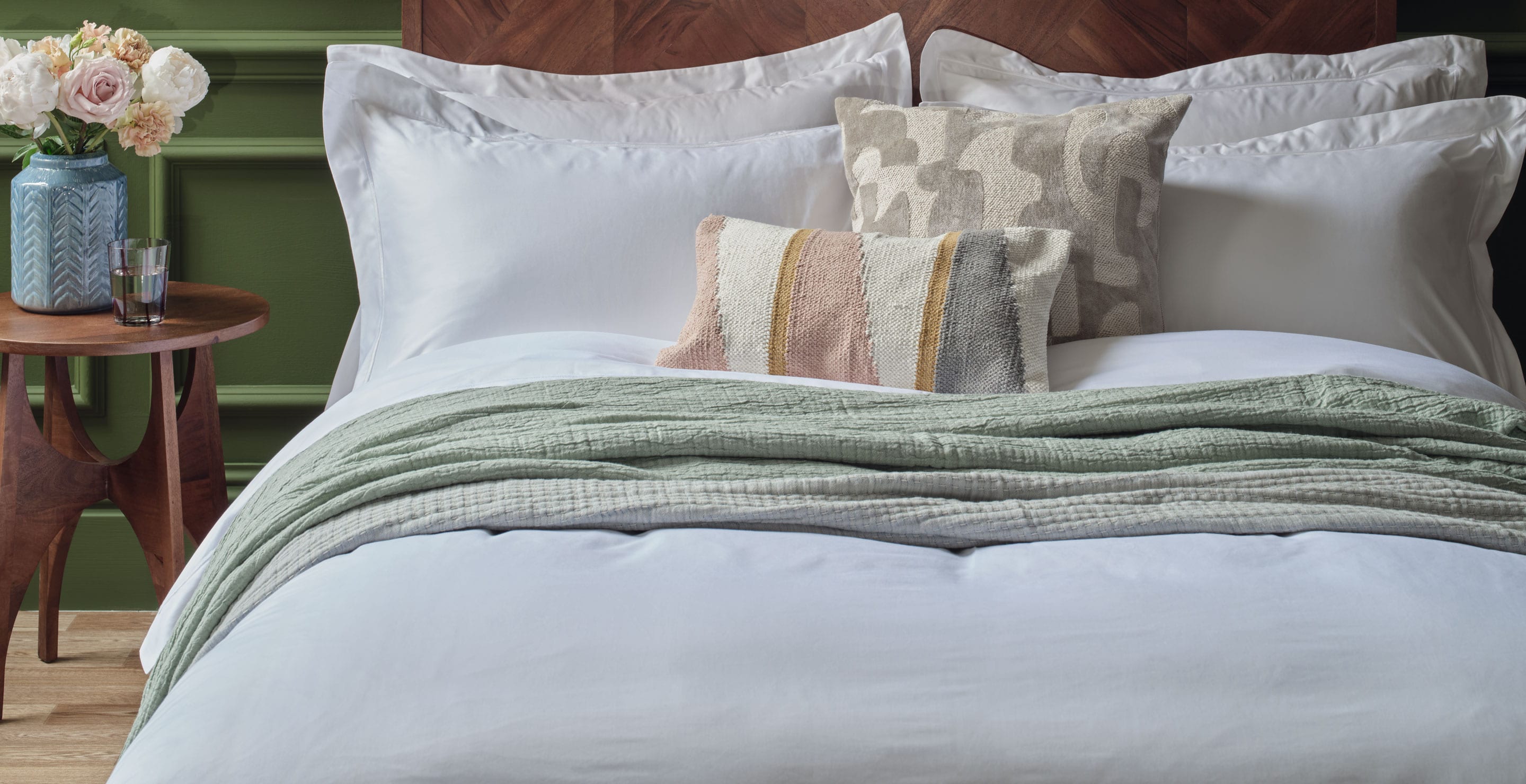 White Egyptian cotton bedding on a bed with a summer feel. Scooms