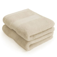 Folded pair of natural colour Egyptian cotton face cloths | Scooms