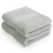 Folded pair of sage green Egyptian cotton face cloths | Scooms