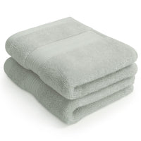Folded pair of sage green Egyptian cotton face cloths | Scooms