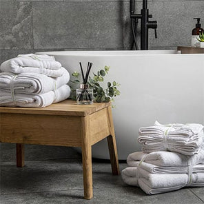 Luxury Cotton towels in a luxury bathroom. Scooms