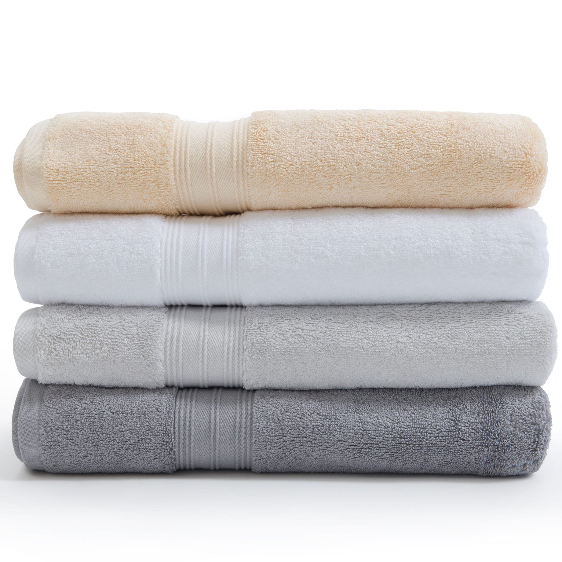 White, silver grey, pearl grey, and creme Egyptian cotton towels in a pile. Scooms