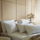 Hungarian goose down pillows on a bed. scooms
