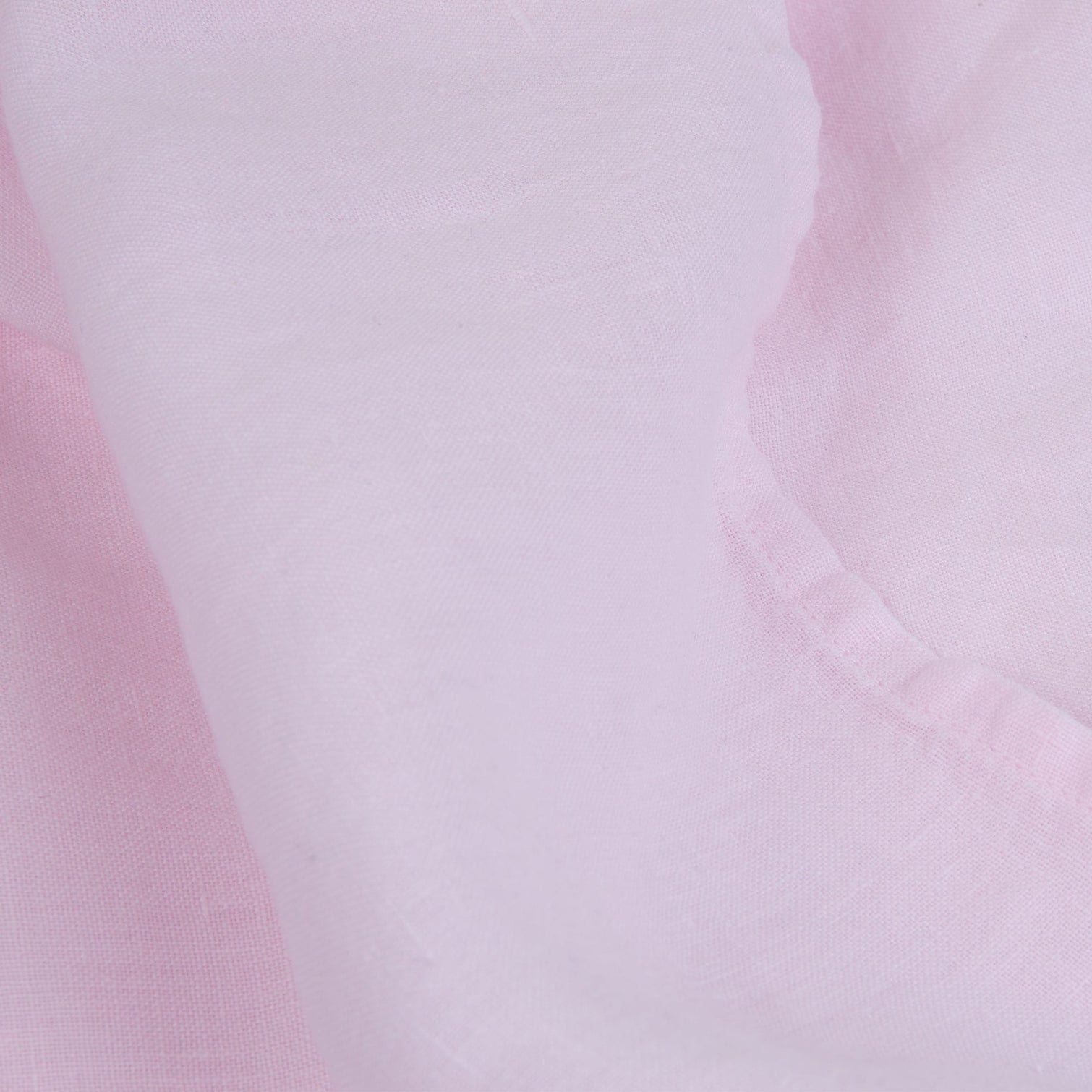 Pink linen sheets detail. Scooms
