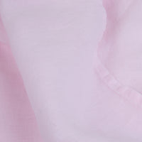 Pink linen sheets detail. Scooms