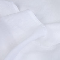 White linen sheets detail. Scooms
