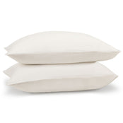 White linen pillowcase pair on pillows. Scooms
