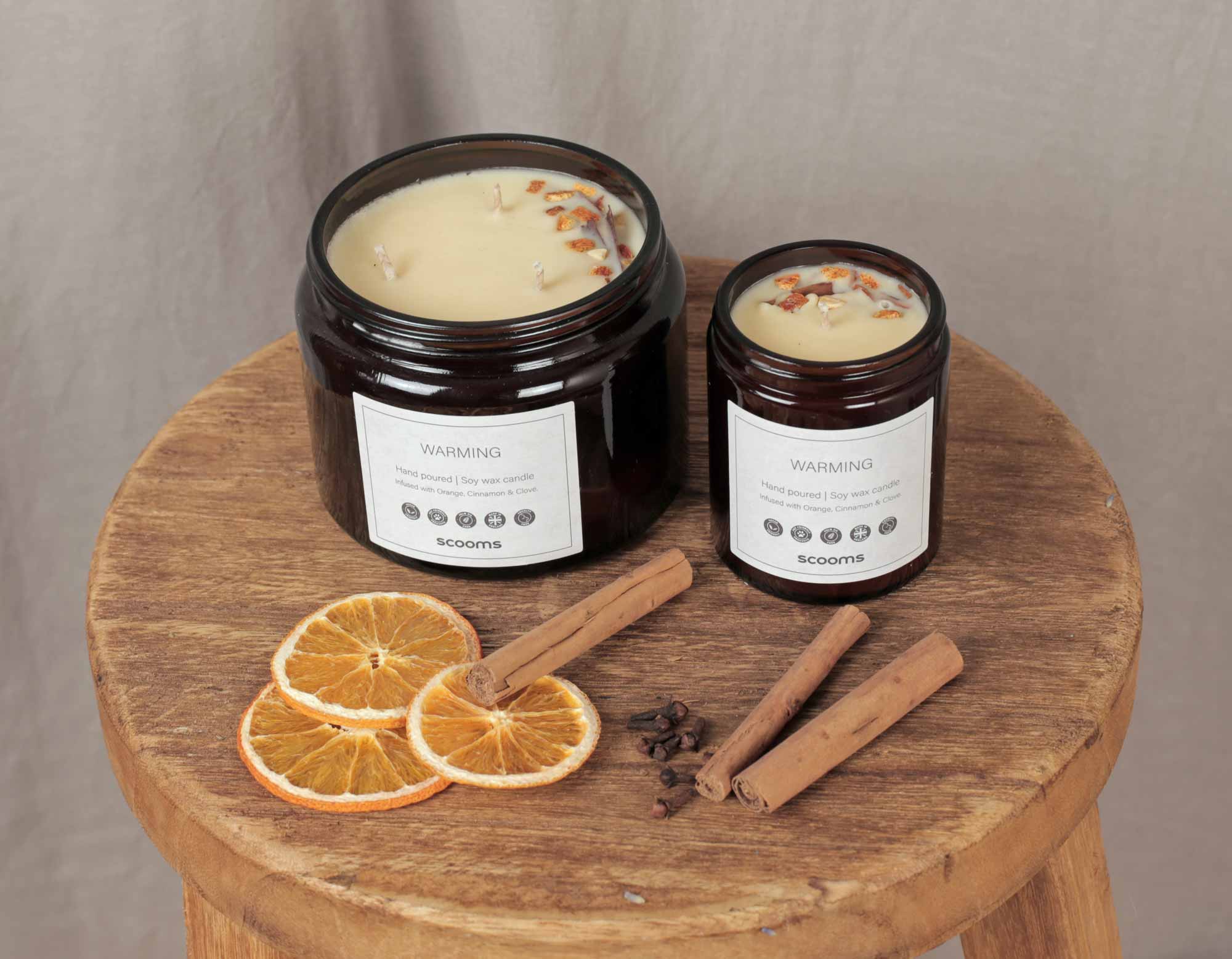 Warming natural scented candles with orange, cinnamon and clove