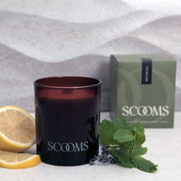 Natural scented candle in an amber glass jar with gift box, lemon, lavender and a sprig of mint | Scooms