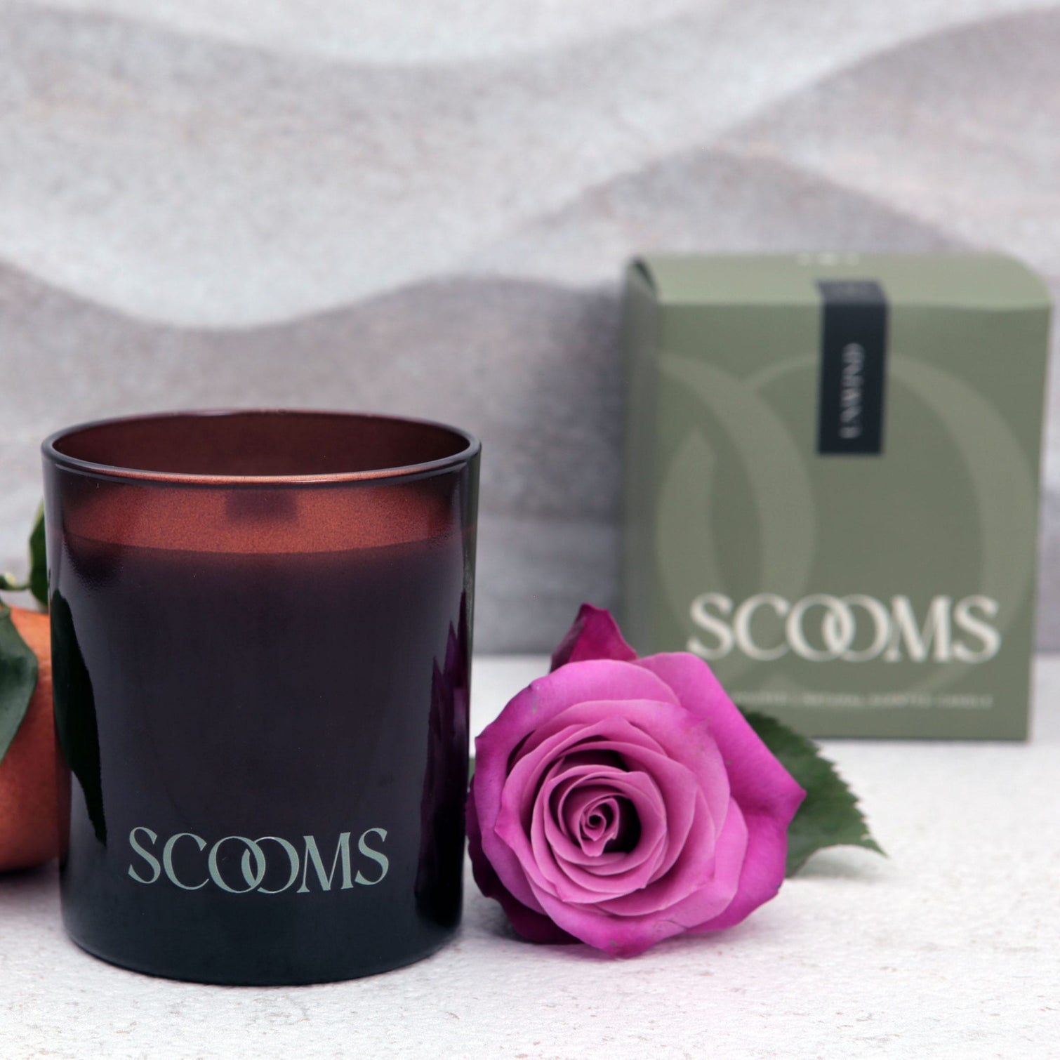 Natural scented candle in an amber glass jar with gift box, orange and a rose | Scooms