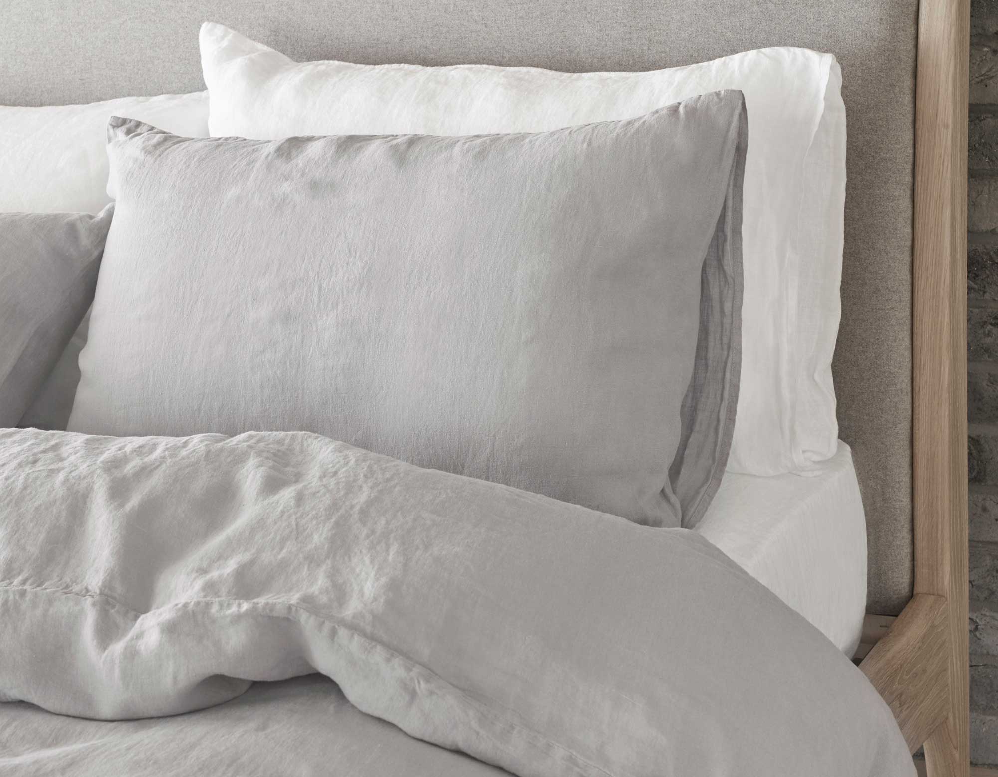 Close-up of grey linen super king duvet cover and pillowcases 