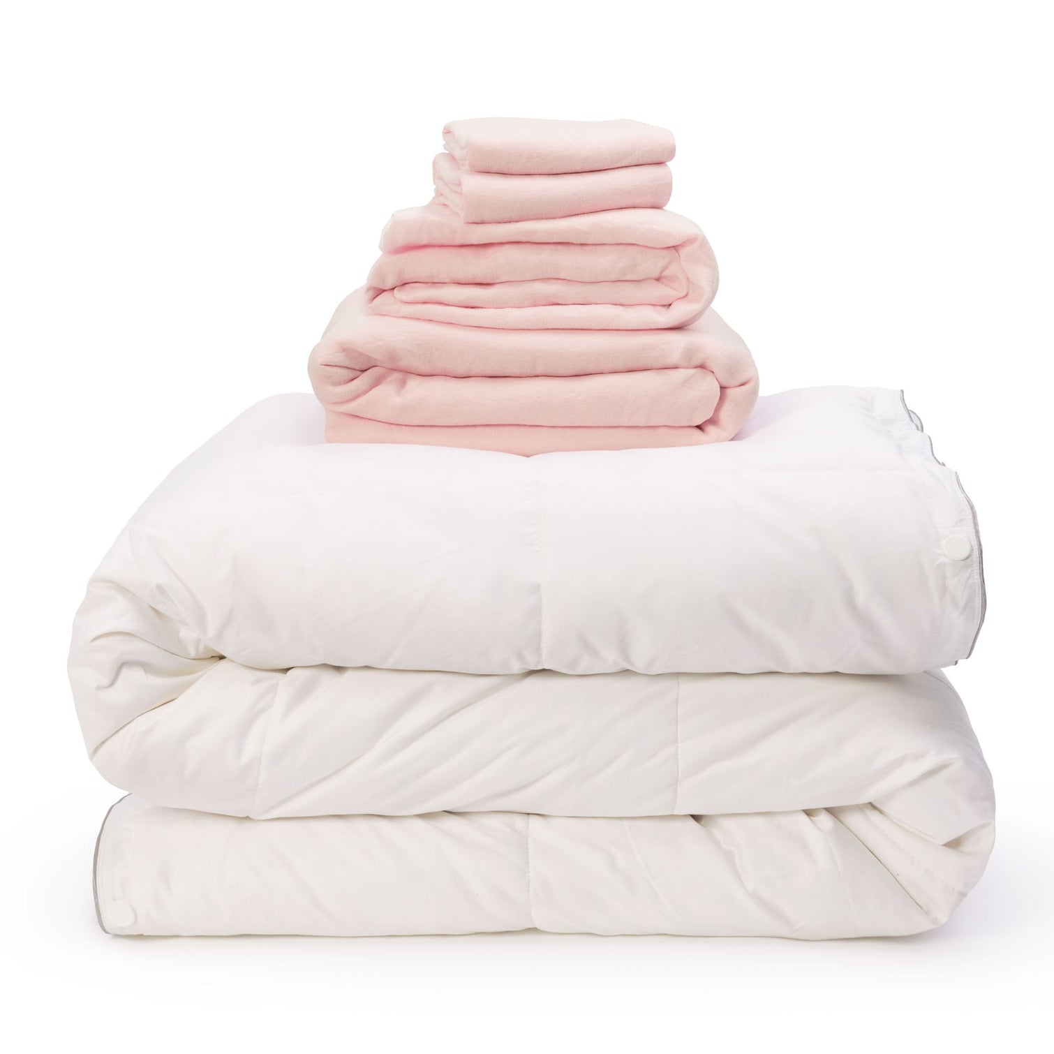Pink linen bedding bundle consisting of an all seasons 13.5 tog (4.5 tog + 9 tog) down duvet, linen duvet cover, linen sheet and linen pillowcases. Scooms