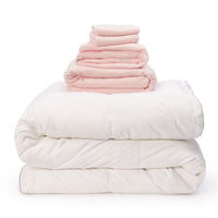 Pink linen bedding bundle consisting of an all seasons 13.5 tog (4.5 tog + 9 tog) down duvet, linen duvet cover, linen sheet and linen pillowcases. Scooms