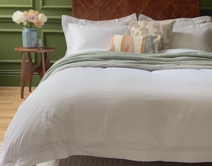 Egyptian cotton duvet cover, pillowcases and sheets on a luxury bed