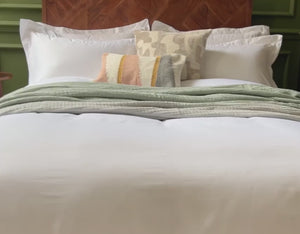 Egyptian cotton duvet cover, pillow cases and sheets on a luxury bed