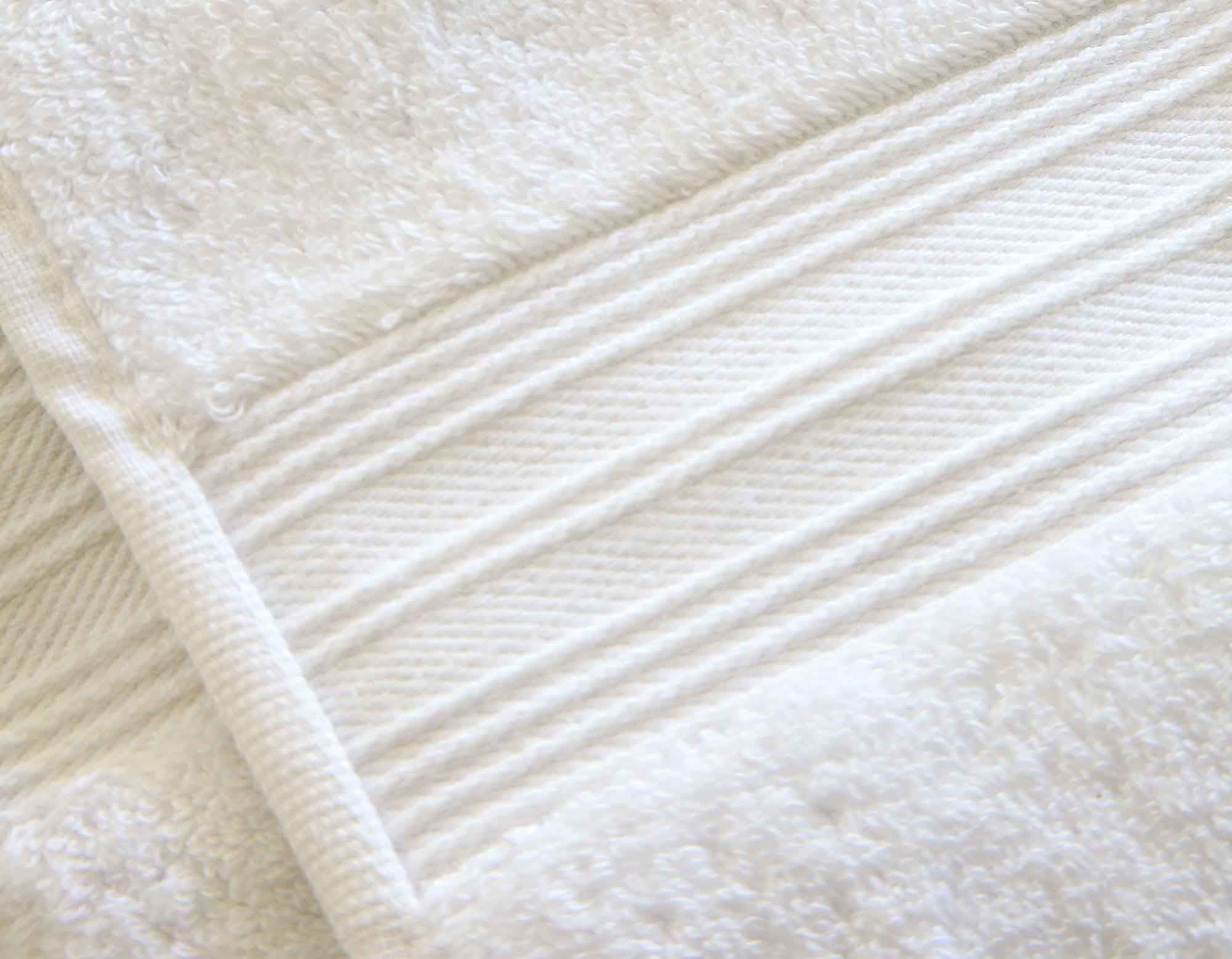 White Egyptian cotton bath sheet detail showing edging and border 