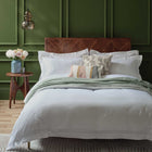 White Egyptian cotton bedding on a luxury bed. Scooms