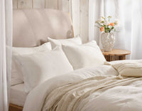 White Linen Sheet on Summer Bed