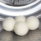Wool dryer balls in a tumble dryer. Scooms