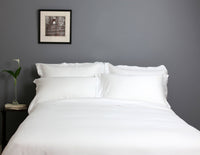 Made Bed With Egyptian Cotton Duvet Cover In white | scooms